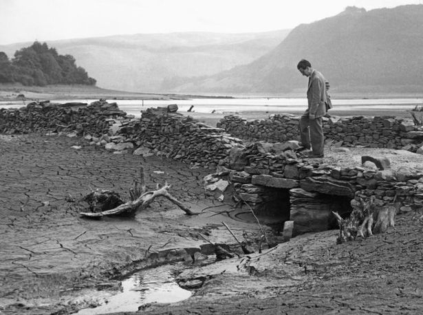 remains of the village of Llanwddyn emerge from the water for the first time since the village was flooded